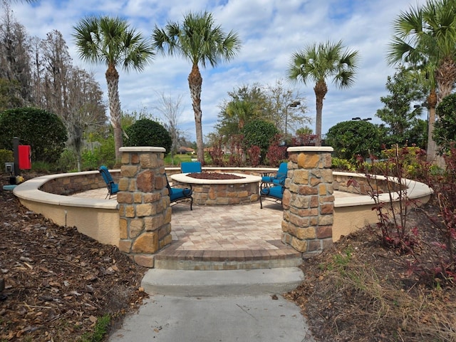 view of patio featuring an outdoor fire pit