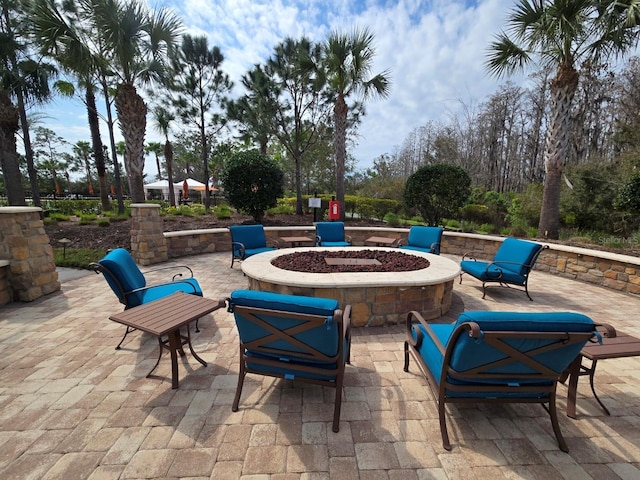 view of patio / terrace with a fire pit