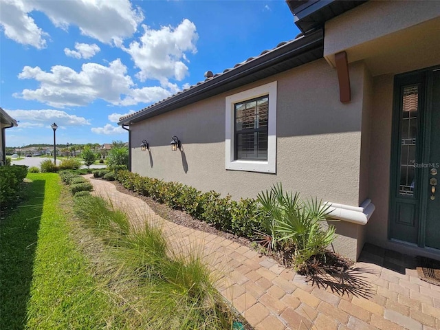 view of home's exterior featuring stucco siding