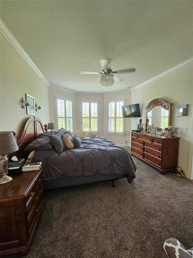 carpeted bedroom featuring multiple windows, a textured ceiling, and ornamental molding