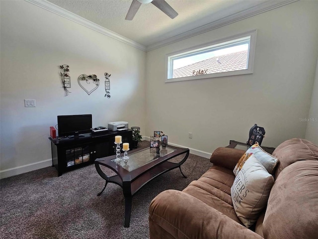 carpeted living area with a textured ceiling, a ceiling fan, baseboards, and ornamental molding