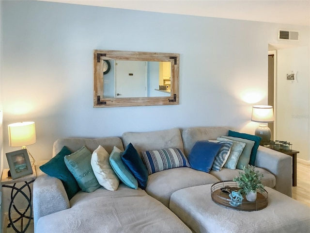 living room with light hardwood / wood-style flooring