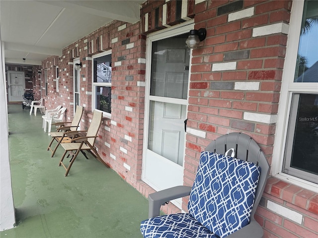 view of patio featuring a porch