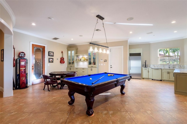 game room with sink, pool table, crown molding, and light tile flooring