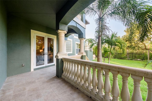 balcony featuring french doors