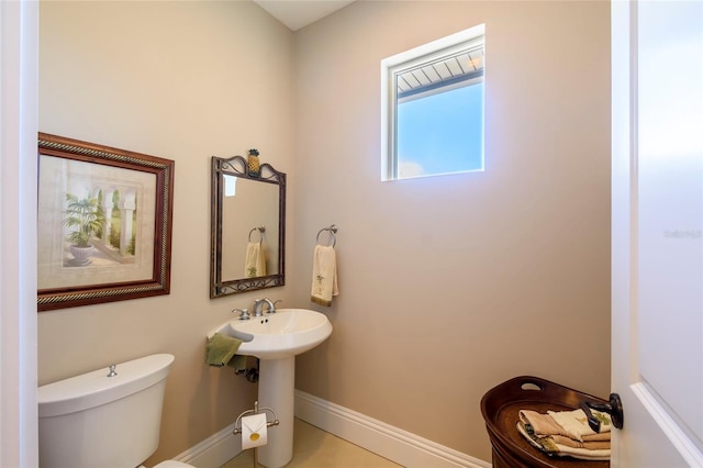 bathroom with toilet and sink