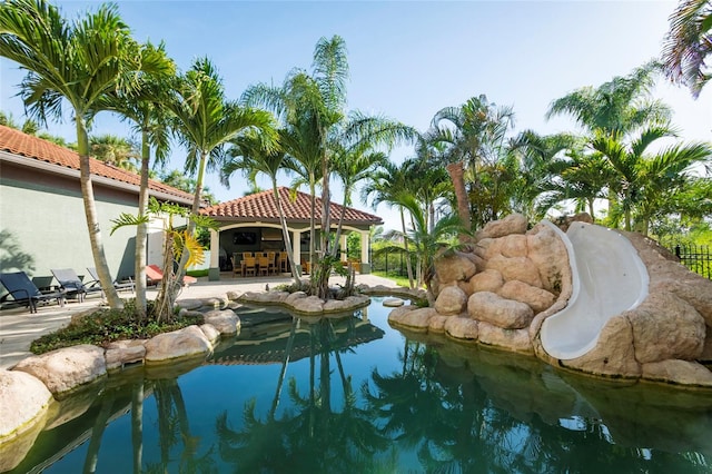 view of swimming pool with a patio and a gazebo