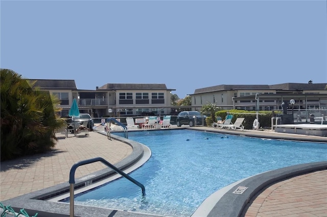 view of pool featuring a patio