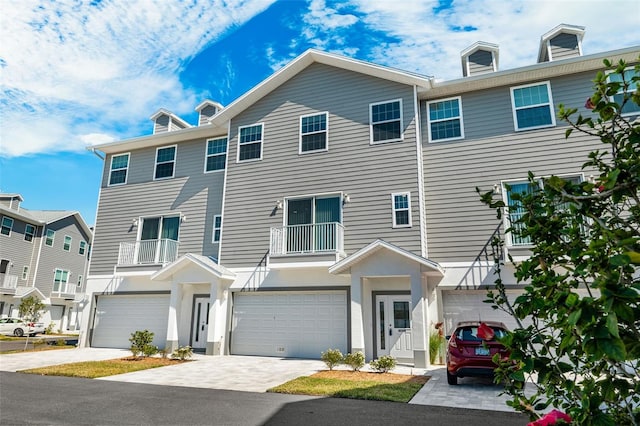 view of front of property with a garage