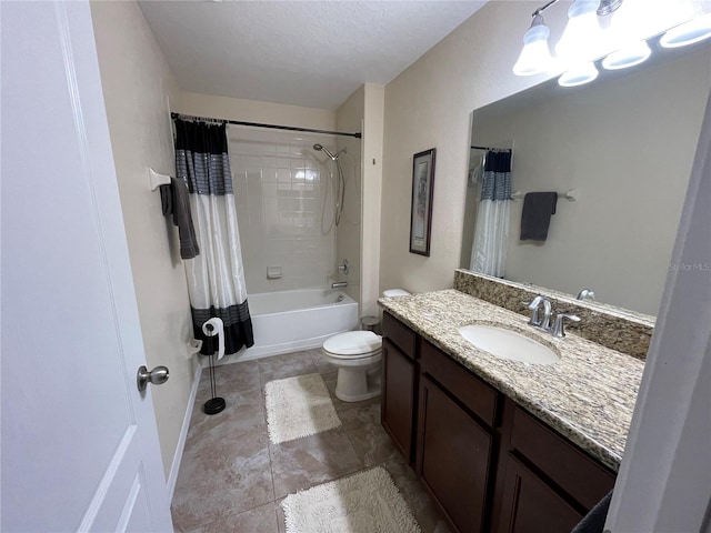 full bathroom with toilet, shower / bath combo with shower curtain, a textured ceiling, vanity with extensive cabinet space, and tile floors