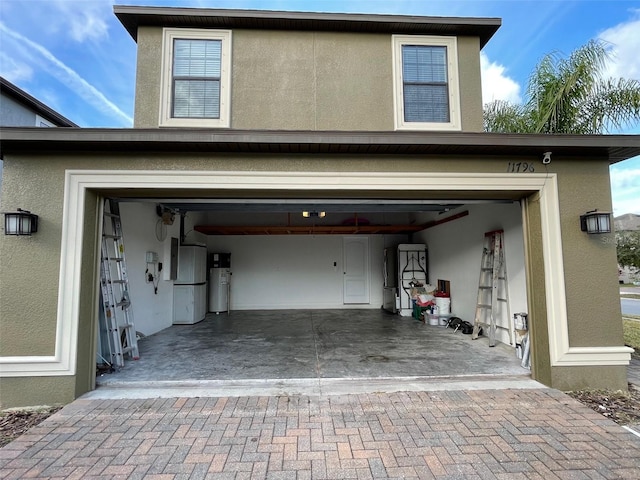 garage featuring gas water heater