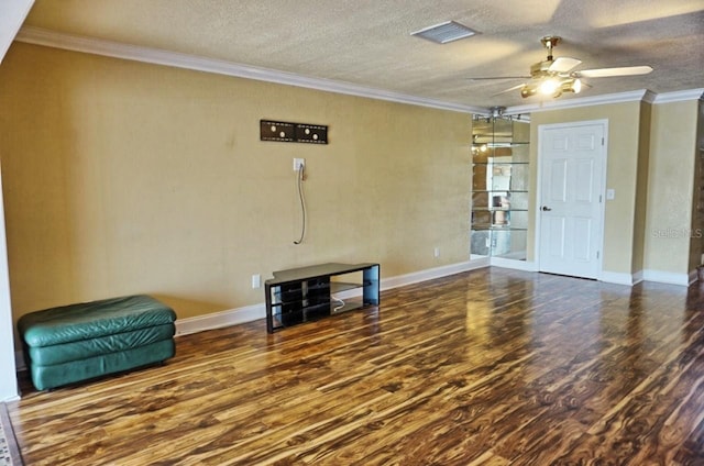 unfurnished room with ceiling fan, ornamental molding, a textured ceiling, and hardwood / wood-style floors