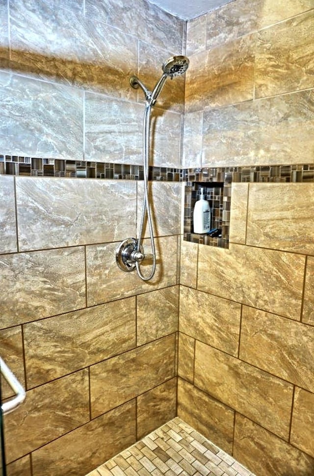 room details with a tile shower