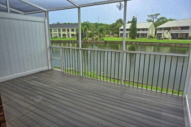 wooden terrace with a water view