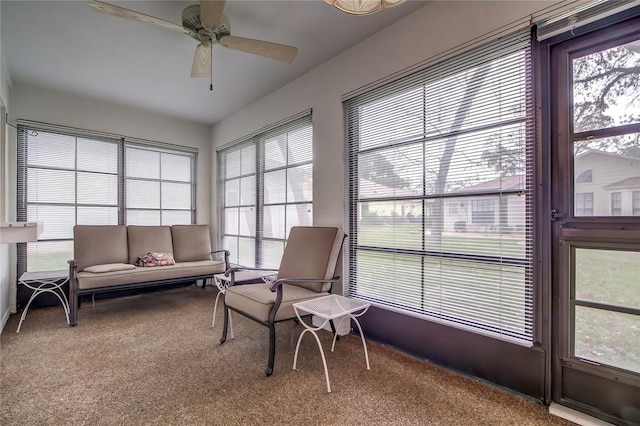 sunroom / solarium with ceiling fan