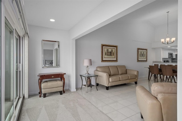 living room featuring light carpet, a chandelier, and lofted ceiling