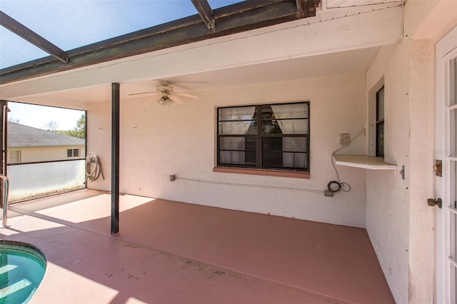 view of patio / terrace featuring ceiling fan