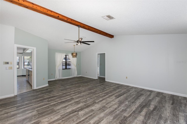 unfurnished living room with ceiling fan, dark wood-type flooring, and lofted ceiling with beams