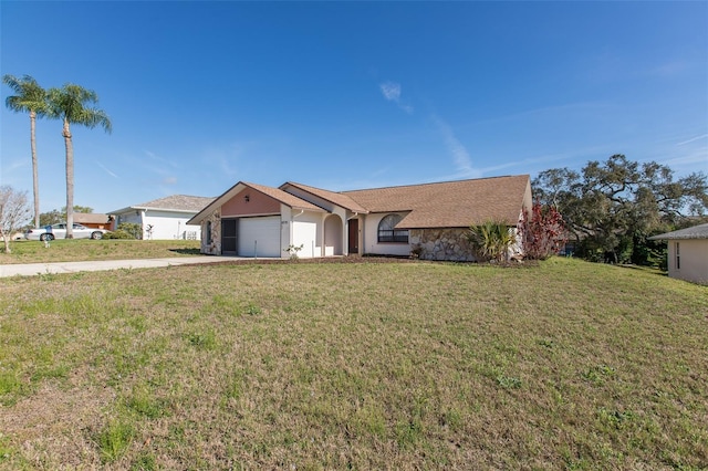 single story home featuring a front yard