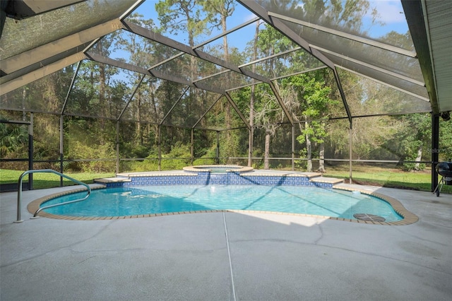 view of swimming pool featuring a lanai, a patio area, and an in ground hot tub