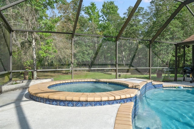 view of pool featuring an in ground hot tub and glass enclosure