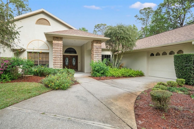 view of front of property featuring a garage