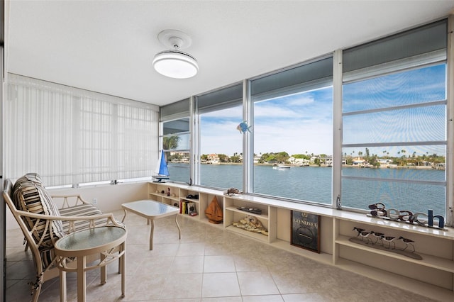 sunroom with a water view