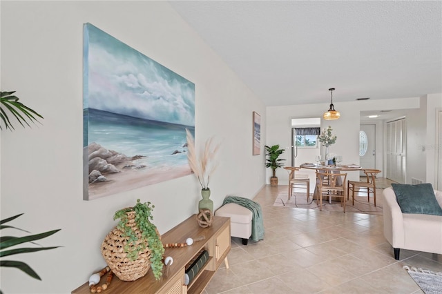 living room featuring light tile patterned floors