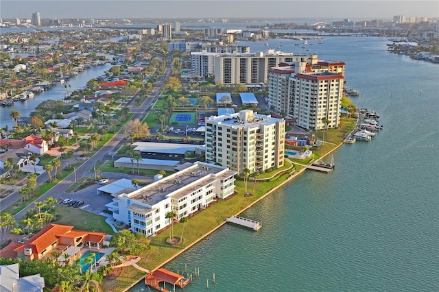 bird's eye view featuring a water view and a city view