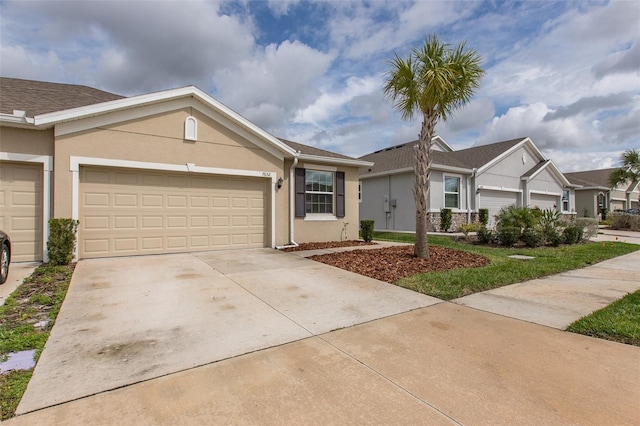 ranch-style house featuring a garage