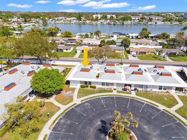 bird's eye view with a water view