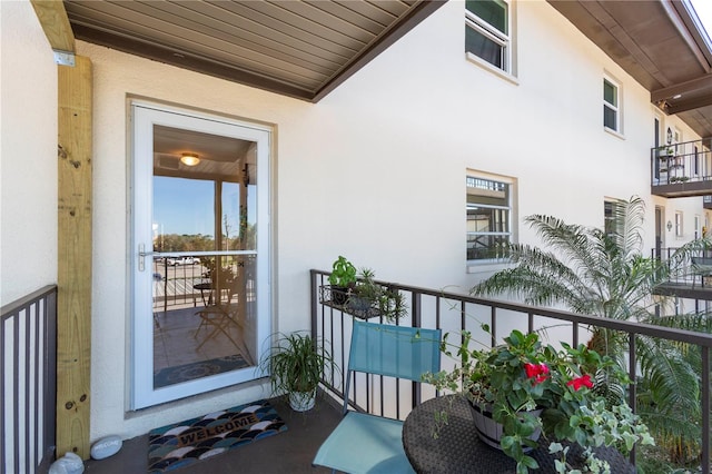 entrance to property with a balcony