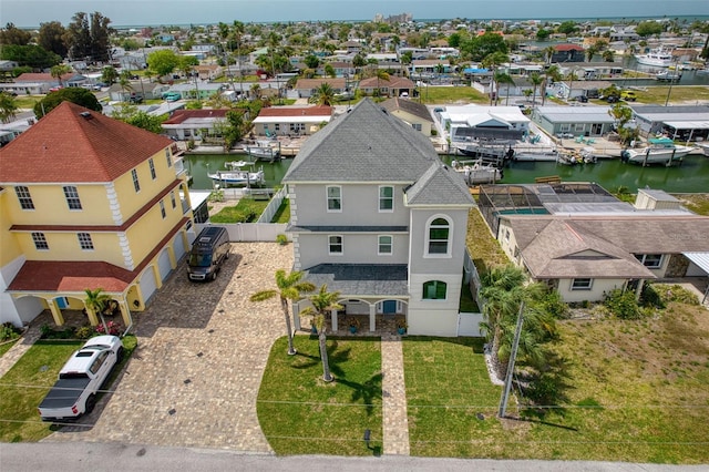 bird's eye view with a water view