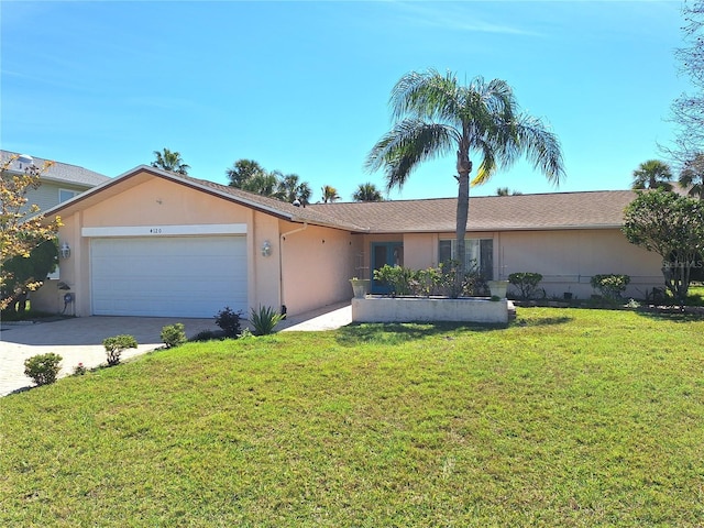 single story home featuring an attached garage, stucco siding, driveway, and a front yard