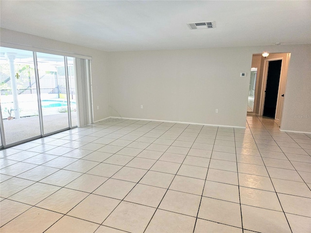 view of tiled spare room