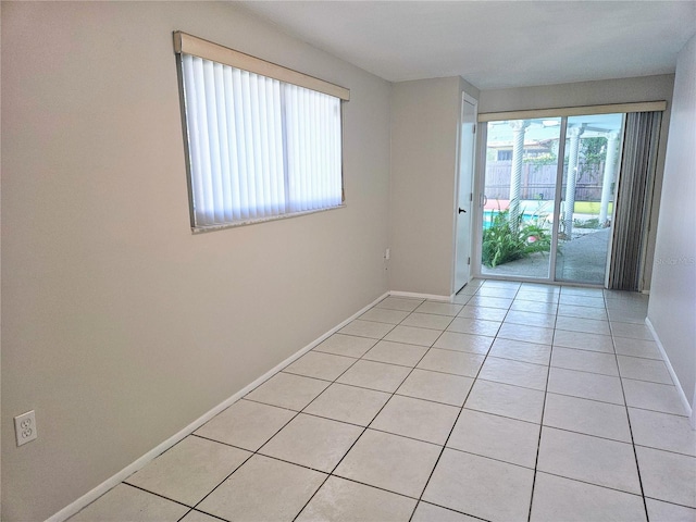 interior space with light tile patterned floors