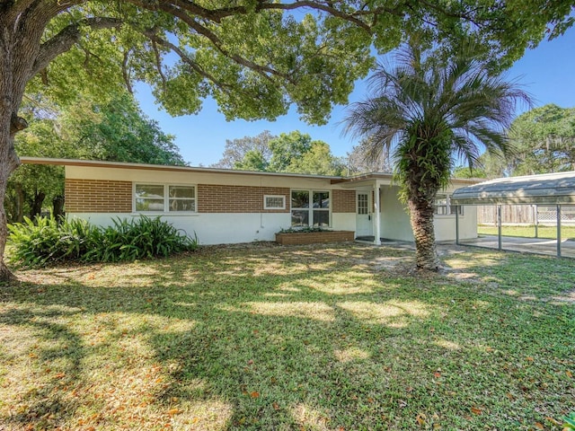 exterior space featuring a front lawn