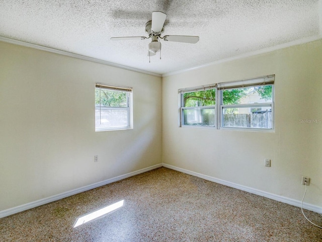 empty room featuring a textured ceiling and ceiling fan