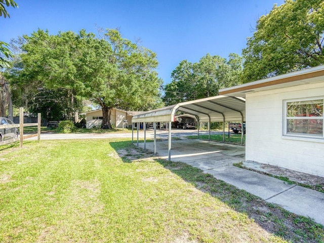 view of yard featuring a carport