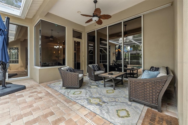 view of patio / terrace featuring outdoor lounge area and ceiling fan