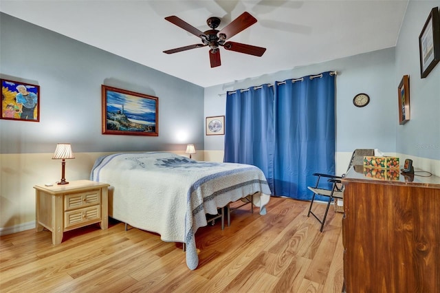 bedroom featuring ceiling fan and light wood-type flooring