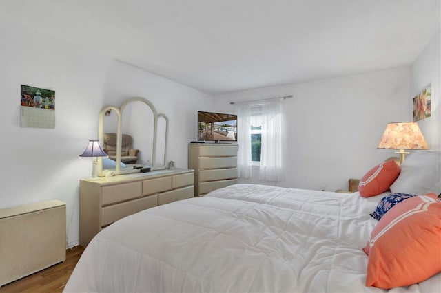 bedroom featuring hardwood / wood-style flooring