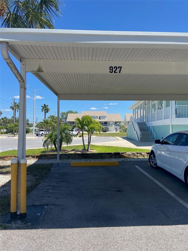 view of parking featuring a carport