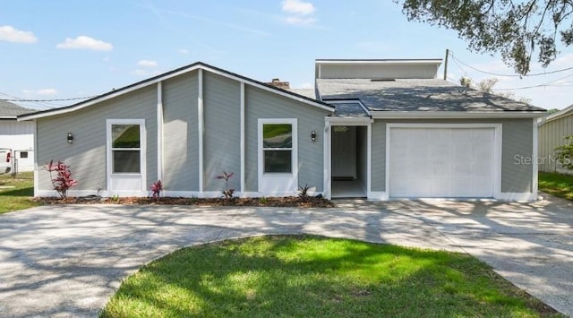 view of front of house with a garage