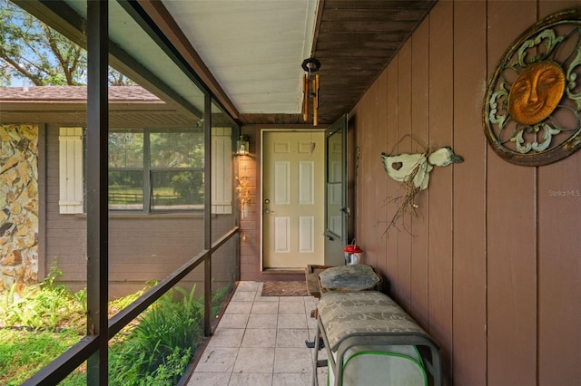 unfurnished sunroom featuring a healthy amount of sunlight