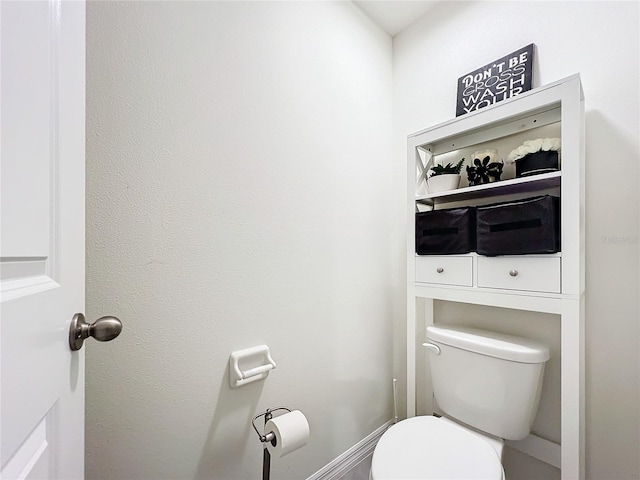 bathroom featuring toilet