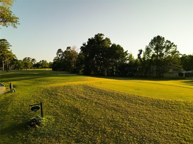 surrounding community featuring a lawn