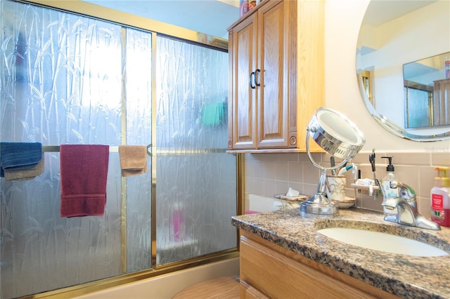 bathroom with tasteful backsplash and oversized vanity