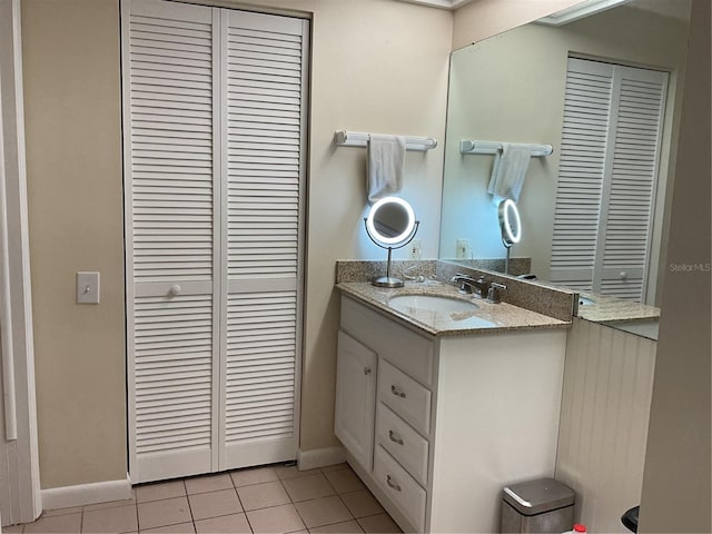 bathroom with vanity and tile patterned floors