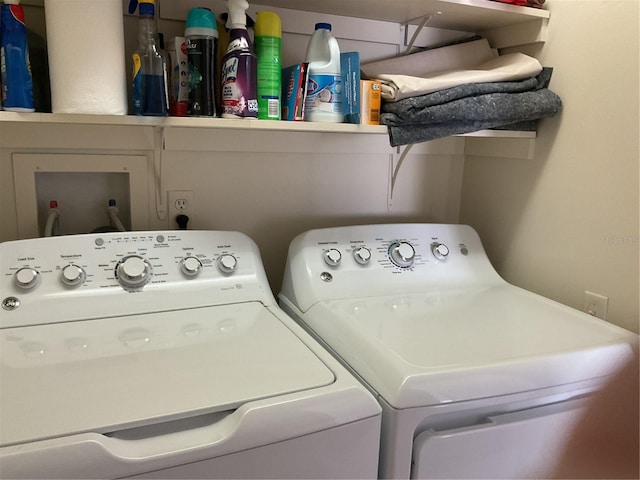 laundry area with washer and dryer